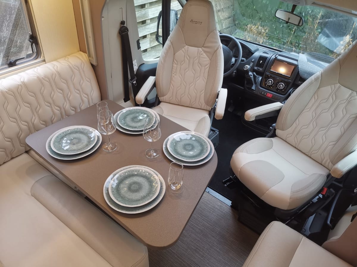 Luxury semiintegrated Burstner camper single beds & pulldown bed from