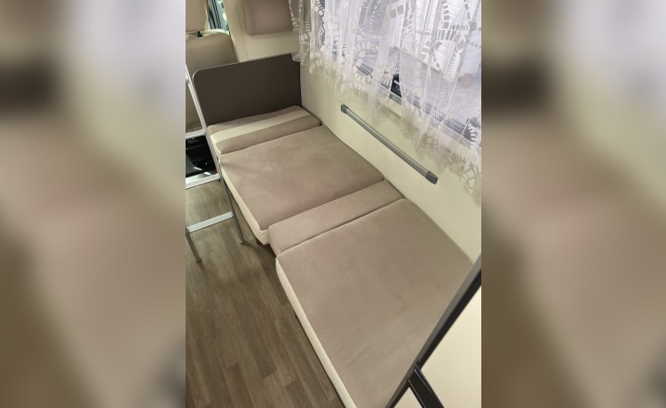 Spacious 7-person Rimor alcove family camper from 2019