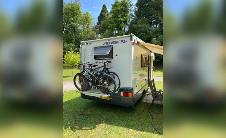 Beau et spacieux camping-car familial, comprenant des commodités