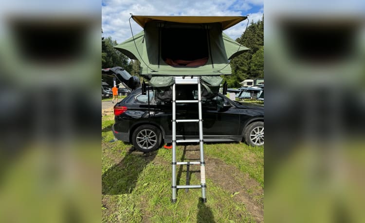 Daktent huren – Tente de toit Thule avec BMW X1