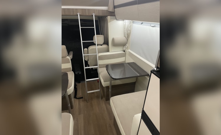 Spacious 7-person Rimor alcove family camper from 2019