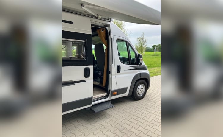 Heunie 1 – Bellissimo camper bus con 2 letti longitudinali