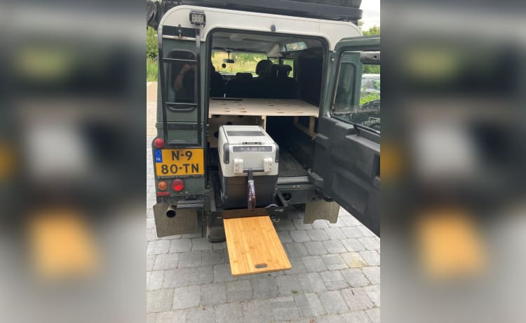 Land Rover Defender met daktent 