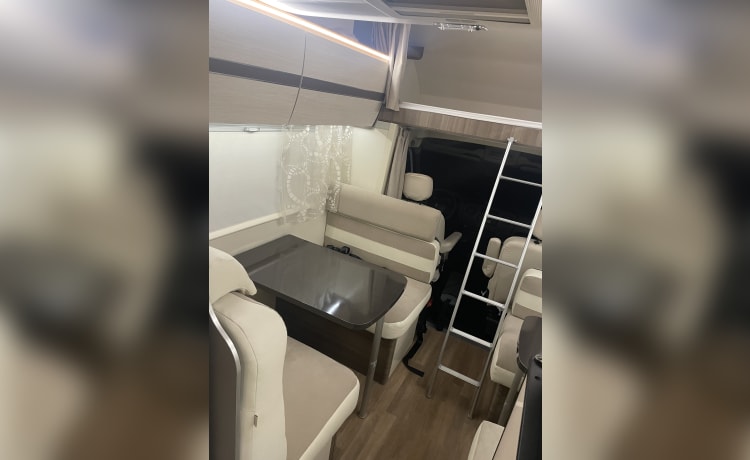 Spacious 7-person Rimor alcove family camper from 2019