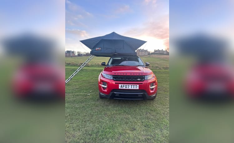 Dora the explorer  – 2-persoons Land Rover Evoque met tentbox