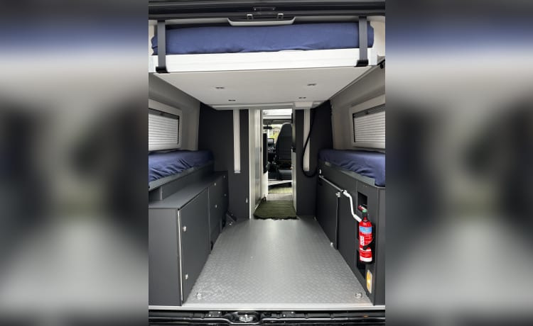 Fiat Adria 640 bus camper with large garage and fold-down bed 