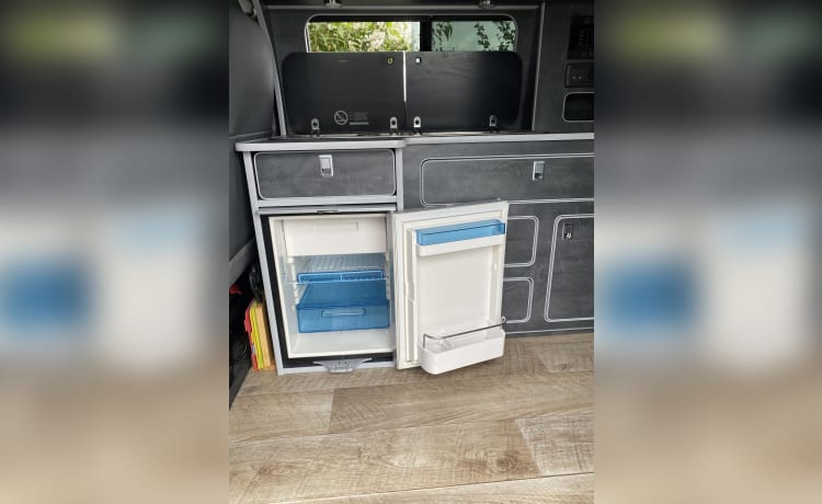 Lucky ☘️ – Camping-car VW Transporter T5.1 (T32) LWB fiable (Pop Top) - Hors réseau.