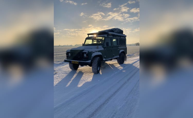 Land Rover Defender met daktent 