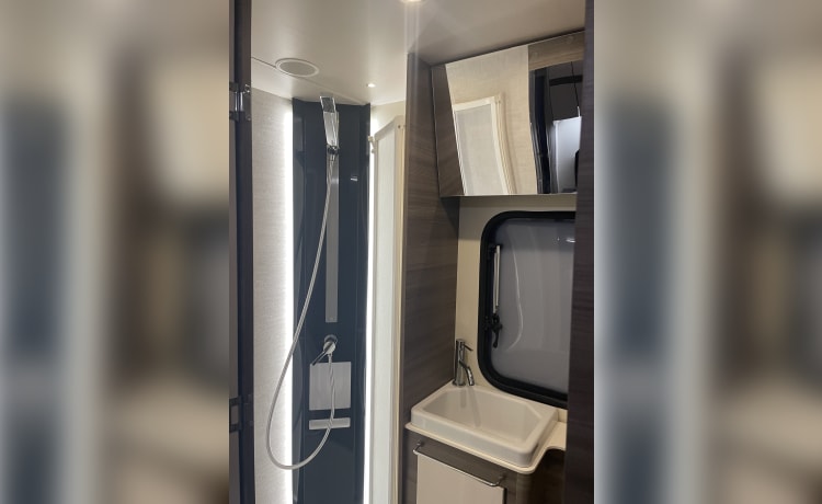 Spacious 7-person Rimor alcove family camper from 2019