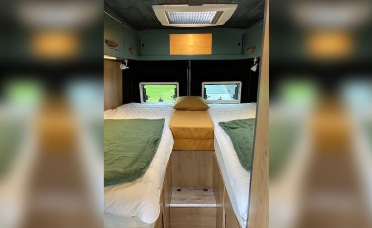 Heunie 1 – Beau camping-car bus avec 2 lits longitudinaux