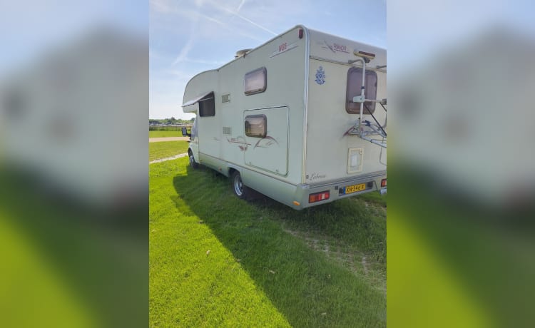 Heerlijke familie camper – 6p Ford alcove uit 2003