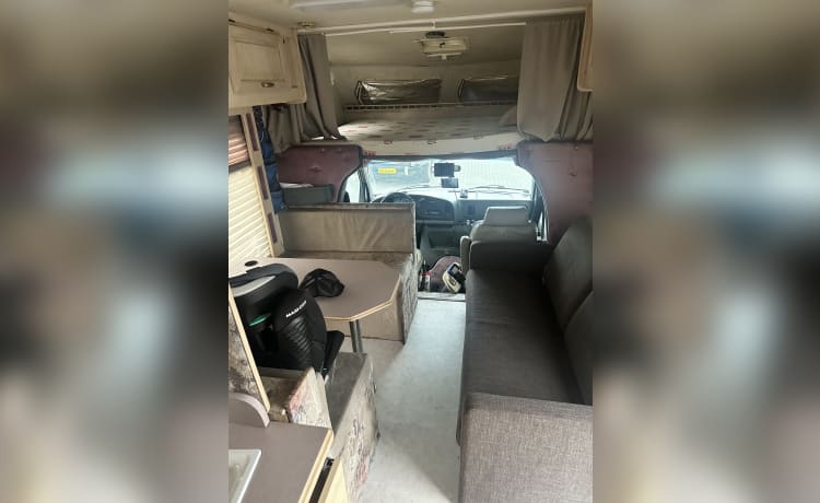 Amerikaanse camper – Ford E350 7,3 L V8 turbo diesel pour 6 personnes avec plateforme moteur