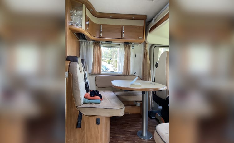 4p Hymer B 674 SL integrated from 2009 including length beds and fold-down bed
