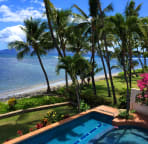 Pool with beach and island views