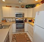 Well equipped kitchen with all new appliances stove/oven, microwave & ice maker