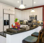 Morning Glory has a fully equipped gourmet kitchen with granite countertops and bar stools.