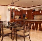 Dining seat 6, plus more seating at kitchen island bar - sample villa