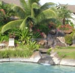 Maui Kamaole pool with waterfall and sand-bottom spa