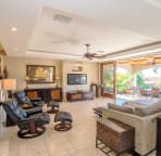Custom 9' Teak Doors Open To The Lanai And Pool Expanding The Living Space