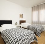 Bedroom three with two single beds