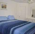 master bedroom with king bed and with bathroom ensuite