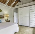 East gardenside King features "Murphy Bunk beds"; full size twin beds which fold up against the wall taking up little space when not in use.