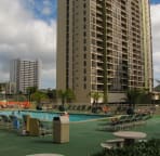View of pool and sun bathing