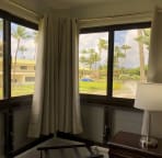 Corner bedroom resort view, blackout curtains can be pulled for darkness/privacy