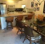 Three swivel bar stools