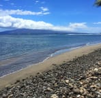 Beach in front of house