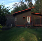 side view of the cottage and deck