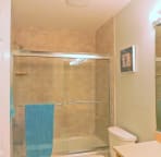 Guest bath with tiled tub and shower