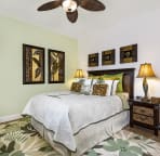 The queen bed awaits for sweet dreams.