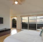 Upstairs master bedroom alone on the top floor for total privacy. Great view