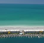 We are on a VERY narrow strip of sand with direct beach and bay views