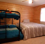 Bedroom #3 with King bed and bunk beds