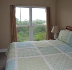 The third bedroom has a king sized bed and a gorgeous view of amazing dune structures.