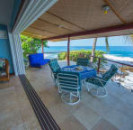 The "disappearing" wall between the living room and lanai is outdoor living at its best.