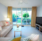 Ground Level condo with private view of pools.