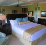 fully mirrored wall, king size bed, crisp and clean Top of the Bed linens, no old bedspreads!