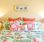 Main floor guest room with luxurious California King bed