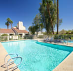 Heated pool and spa are steps from the back patio
