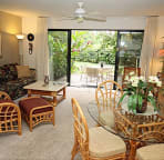 Looking from the kitchen toward the back lanai; bamboo dinette seats four