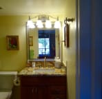 Master bath-shower, woode cabinet, custom framed mirror, grantite counter