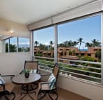 Enjoy a cocktail & view from the living room lanai