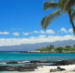 View from beach club toward the Mauna Lani Bay and Bungalow Hotel.
