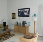 living room on upper level showing 50 inch flat screen TV