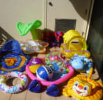 Lots of kids beach gear including floats for babies and young kids