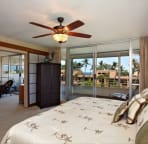 Spacious master bedroom closes off with elegant shoji doors