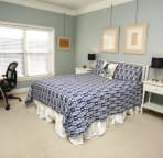 Master Bedroom with Queen bed and desk.